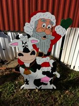 Santa riding a cow in Fort Polk, Louisiana
